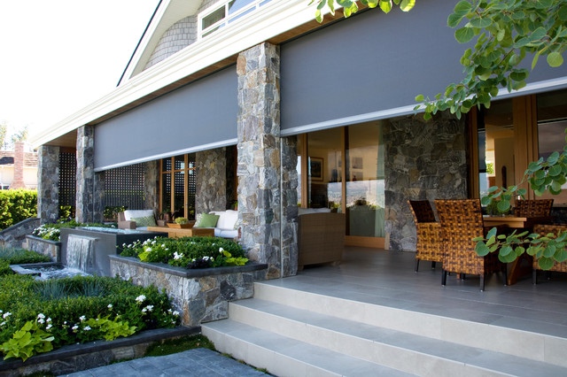 MagnaTrack motorized retractable screen for outdoor living space installed by Qualified Carpentry in Sioux Falls South Dakota
