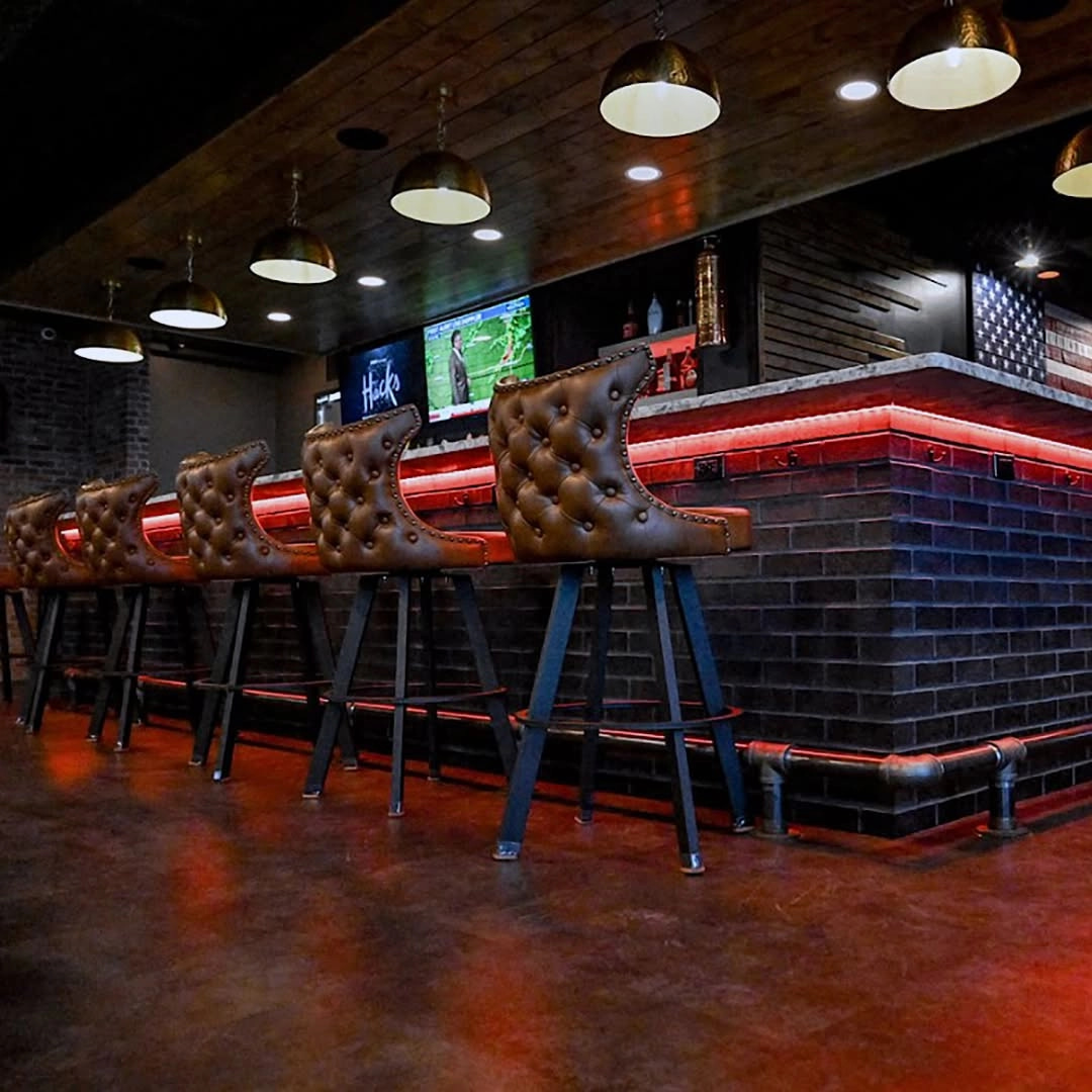 Custom wood plank shiplap ceiling and commercial bar construction by Qualified Carpentry at Hook and Ladder Kitchen and Bar Sioux Falls South Dakota
